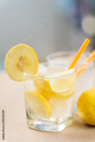 Glass of iced lemonade, cold drink in summer