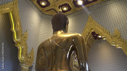 rear view of the solid gold buddha at wat traimit temple in bangkok, thailand photo