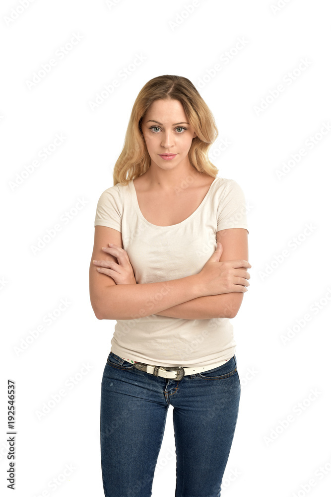 Fototapeta premium 3/4 portrait of blonde girl wearing white shirt, isolated on white background.