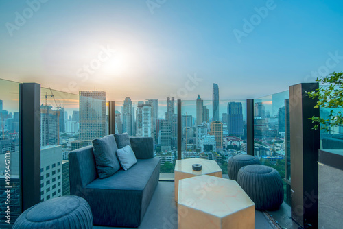Bangkok city view point from rooftop of building, blue sky and city light, Thailand