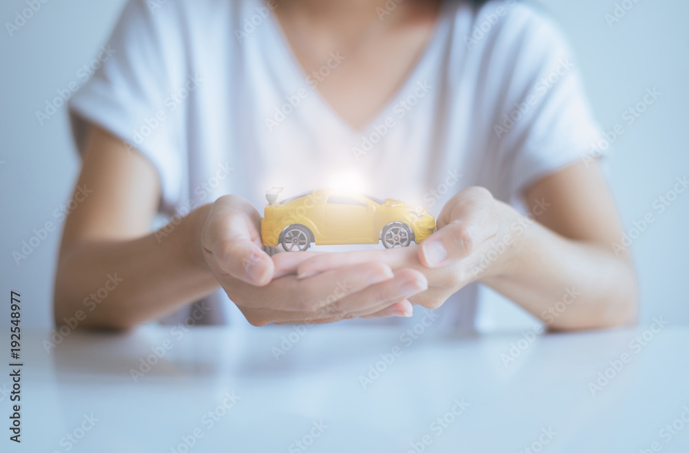 Car model toy on hand,Business and finance concept Car model toy on hand,Business and finance concept