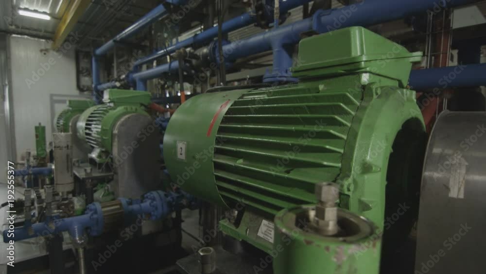Green Compressors Operate on Gas Pipelines Closeup Green Compressors Operate on Gas Pipelines Closeup