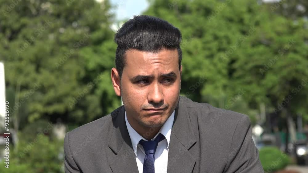 Depressed Hispanic Business Man Depressed Hispanic Business Man
