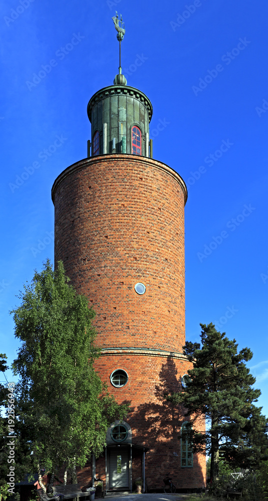 Stockholm, Vaxholm Island, Sweden - Historical sea lighthouse in town of Vaxholm on the Vaxholm island within the Stockholm region