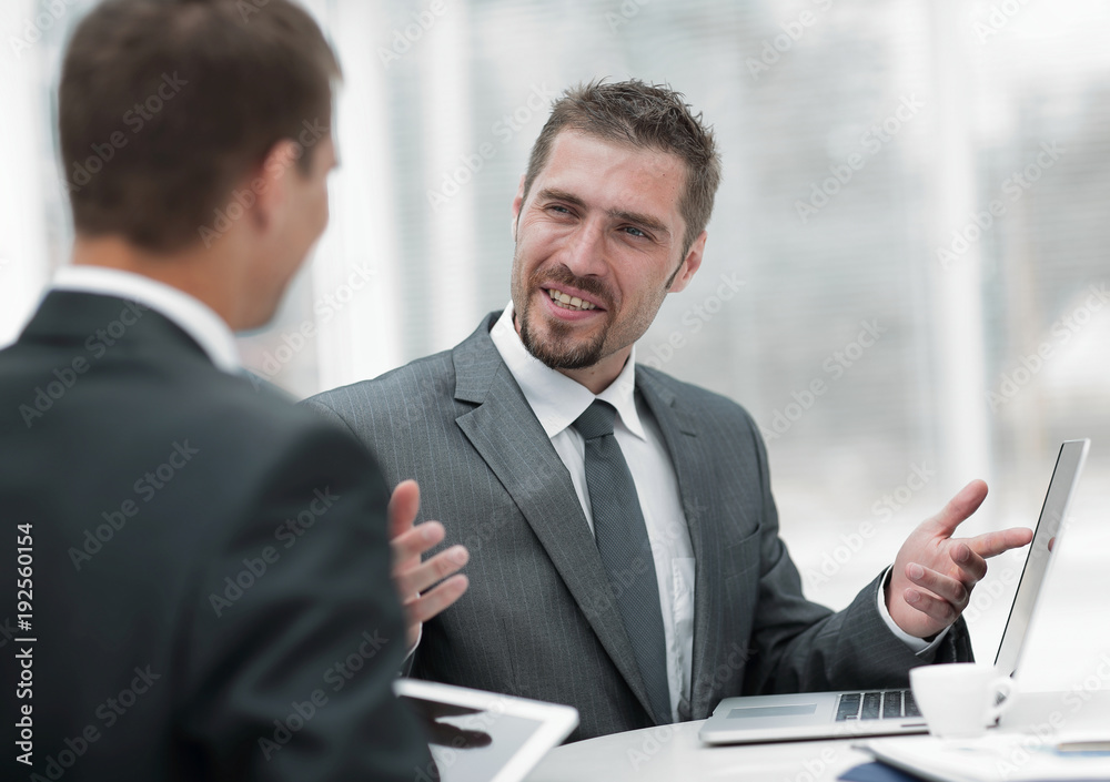 closeup.business partners discussing business issues closeup.business partners discussing business issues