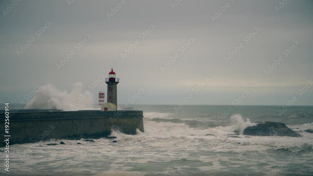 Storm on the Atlantic coast near the old lighthouse, Porto, Portugal. Storm on the Atlantic coast near the old lighthouse, Porto, Portugal.