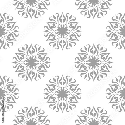 Gray floral ornament on white background. Seamless pattern