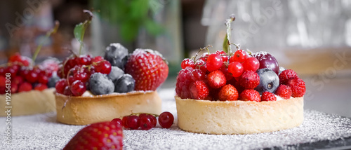 Fotografie, Obraz Berry Tart  - French Pastry Cakes redcurrant blueberry strawberries