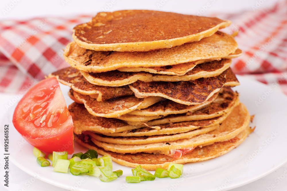 fried pancakes or pancakes are stacked - a traditional dish for the Spring Carnival festival, farewell to winter fried pancakes or pancakes are stacked - a traditional dish for the Spring Carnival festival, farewell to winter