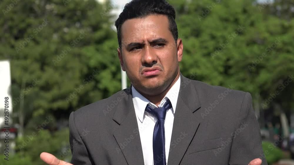 Hispanic Business Man And Confusion Hispanic Business Man And Confusion