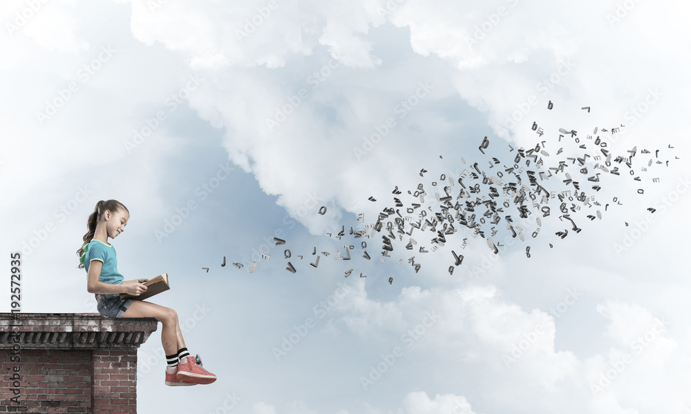 Concept of careless happy childhood with girl exploring this wor