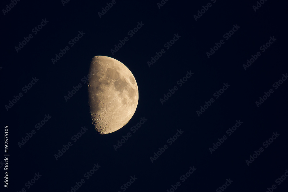 photo of a waxing moon on a clear night photo of a waxing moon on a clear night