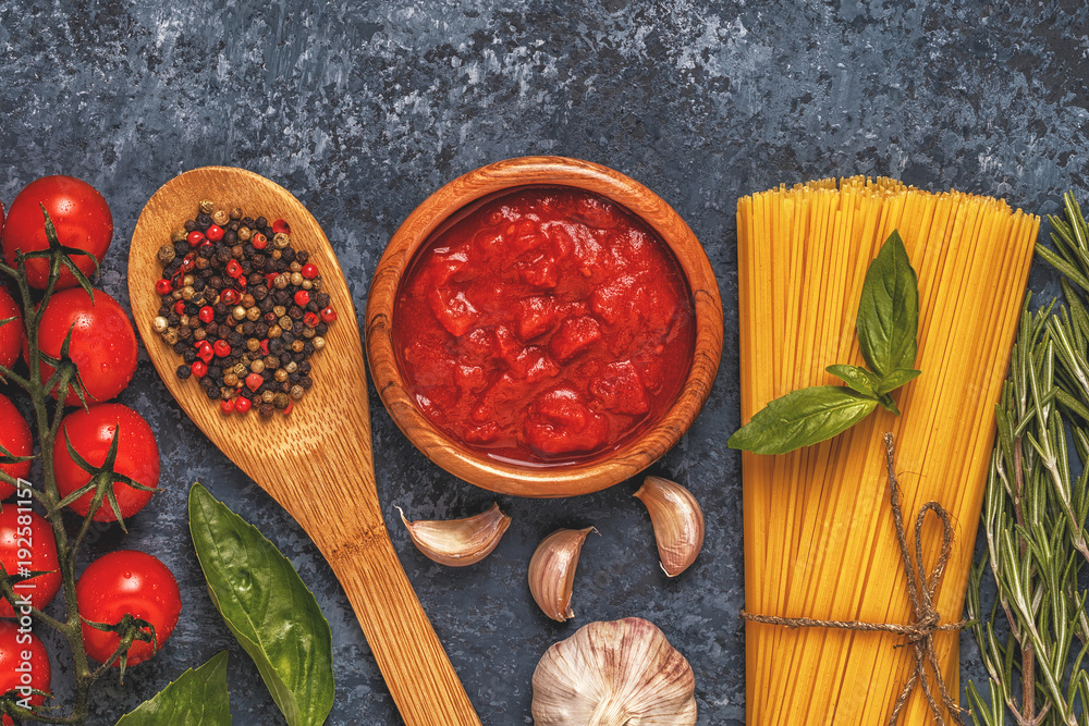 Italian food background with pasta, spices and vegetables. Italian food background with pasta, spices and vegetables.