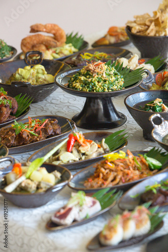 Indonesian cuisine - Many traditional Balinese dishes on the table, top view 