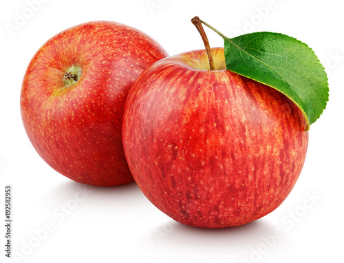 Two ripe red apple fruits with green leaf isolated on white background. Red apples with clipping path