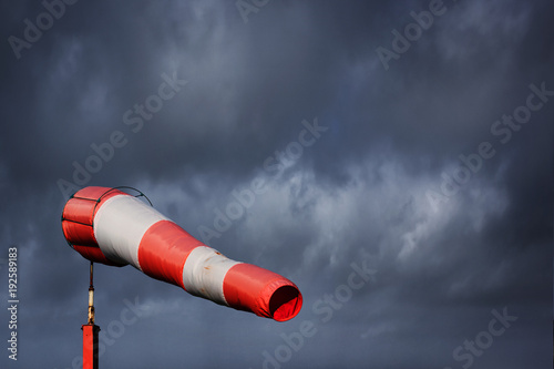 Windsock and stormy sky - storm warning