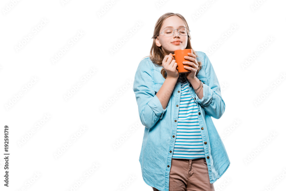 relaxed teenage girl in eyeglasses holding cup of tea isolated on white relaxed teenage girl in eyeglasses holding cup of tea isolated on white