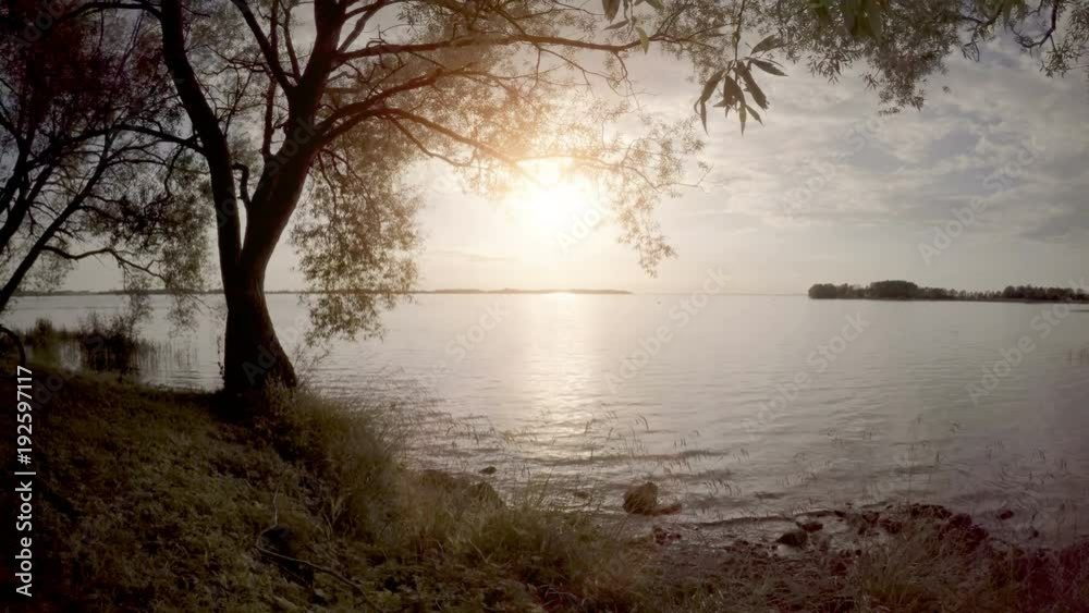 Calm and beautiful nature scene with lake in Sweden. Peaceful and idyllic summer landscape. Calm and beautiful nature scene with lake in Sweden. Peaceful and idyllic summer landscape.