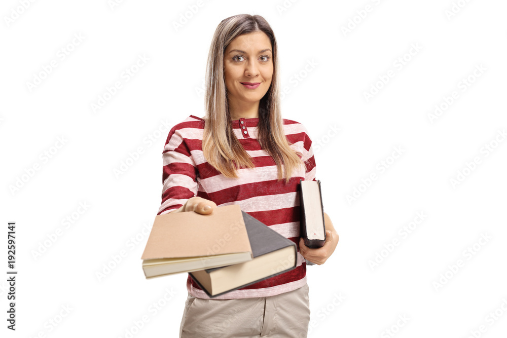 Young woman giving books
