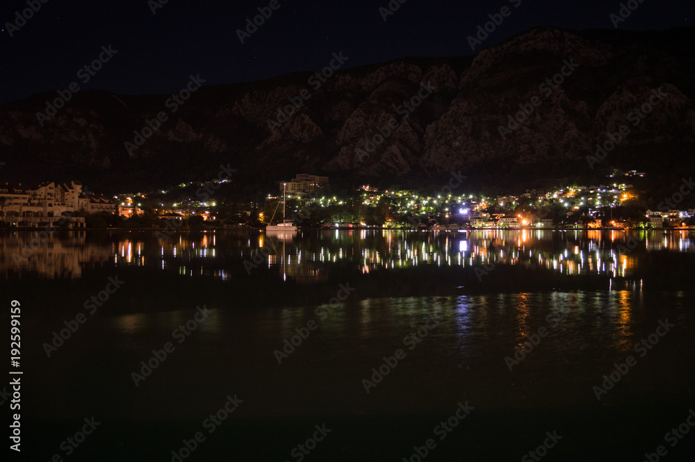Bay of Kotor as Seen from Kotor Port with Reflection of City Lights in the Adriatic Sea at Night, Montenegro
