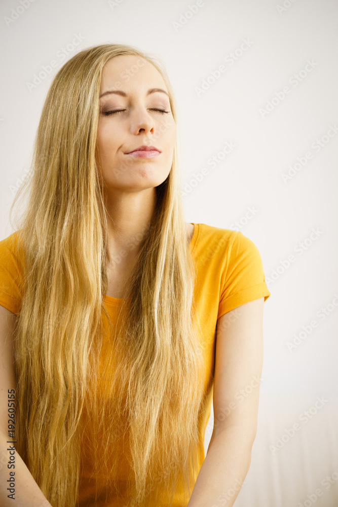Woman with long hair relaxing or meditate Woman with long hair relaxing or meditate