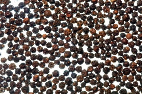 Black pepper grains texture background