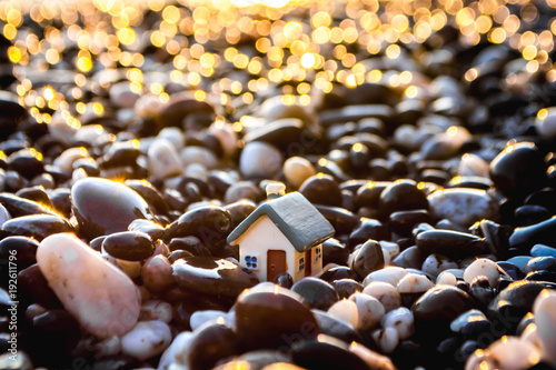 Toy house on the beach