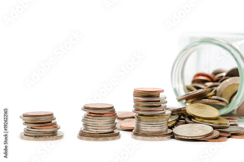 Coins in glass jar and outs...