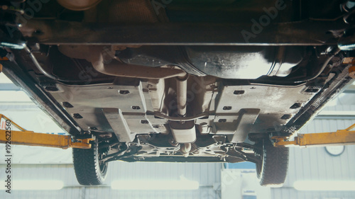 Wallpaper Mural Car service - bottom of the car - the suspension of SUV Torontodigital.ca