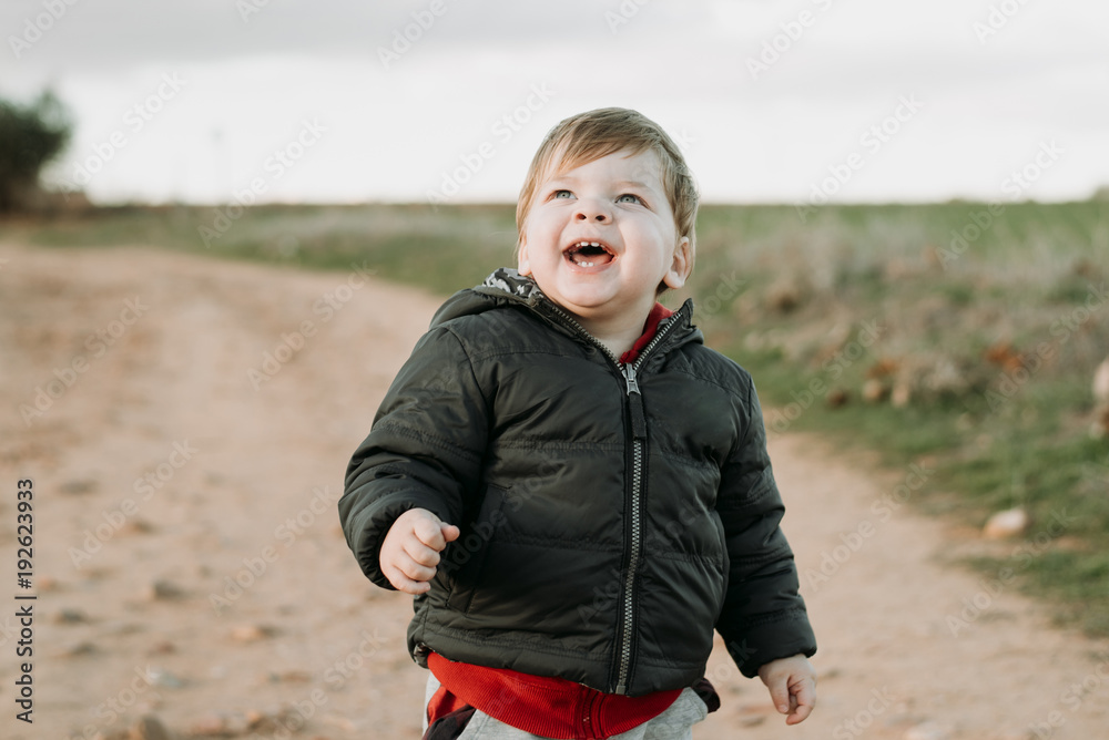Adorable curious infant in countryside Adorable curious infant in countryside