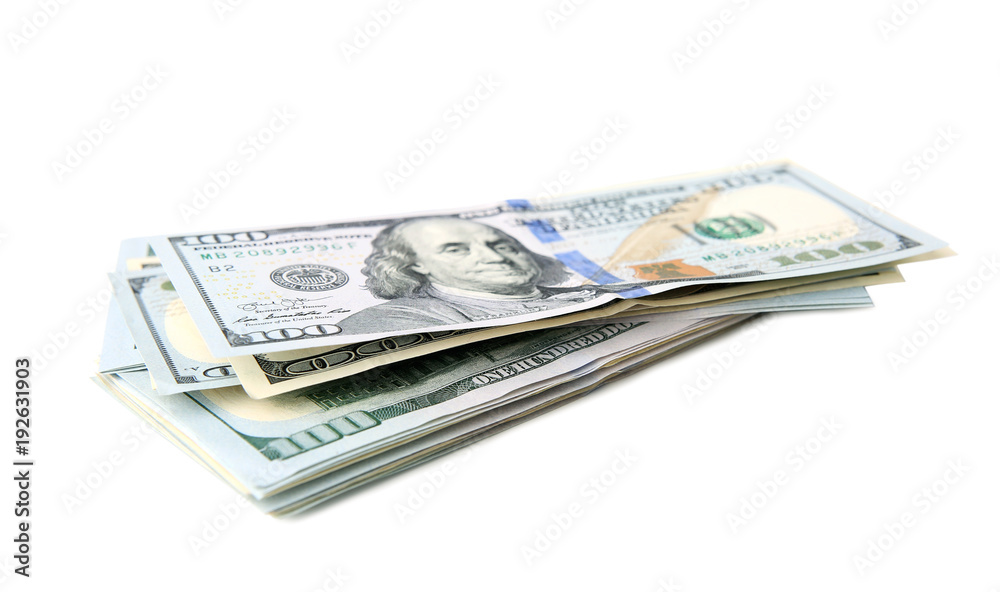 Stack us dollars isolated on white. Stack us dollars isolated on white.