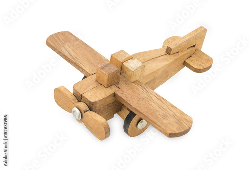 Wooden airplane model isolated over white background