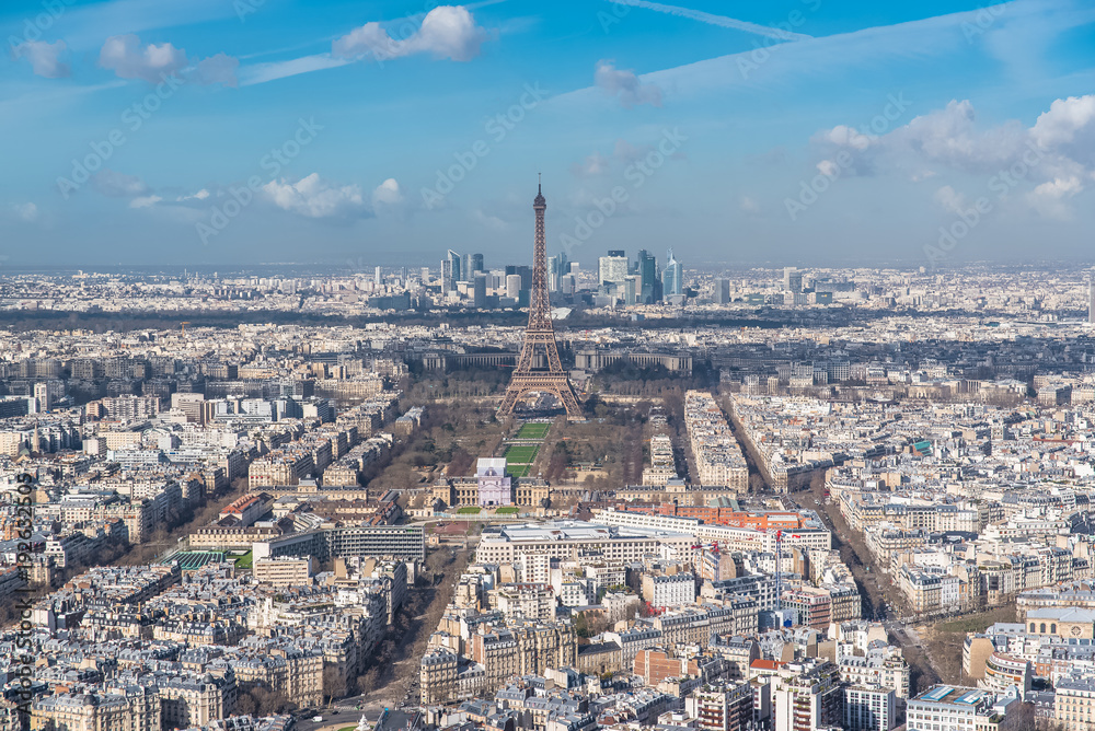 Paris, panorama of the Eiffel tower and la Defense in background, view from the Montparnasse tower

