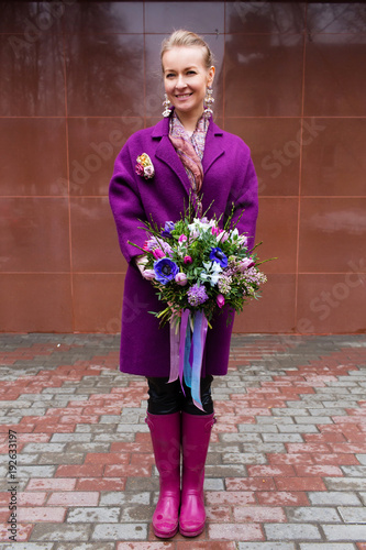 Woman holding beautiful bouquet of flowers photo