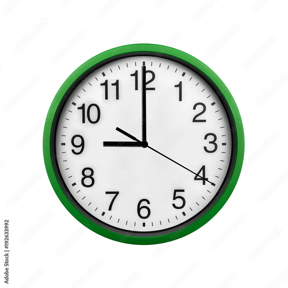 Green wall clock isolated on a white background. Green wall clock isolated on a white background.