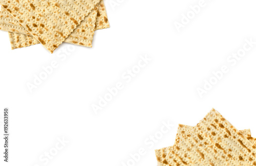 Matzo on white background with space for text. Top view, flat lay.