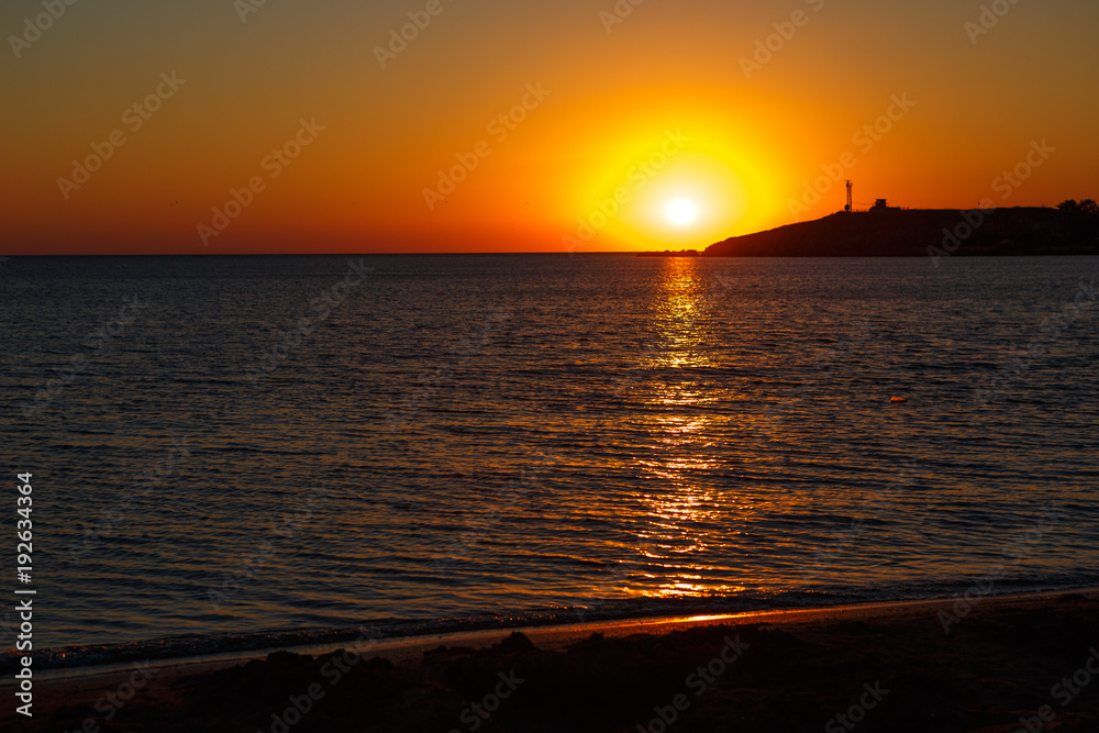 scenic seascape by perfect timing when sunset over sea horizon is beautiful pattern for background