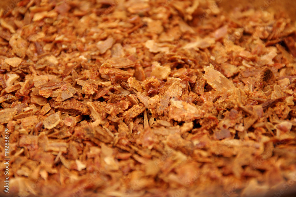 Bee propolis in particles. Macro detail of pieces of fresh natural apiary product called bee glue. Bee propolis in particles. Macro detail of pieces of fresh natural apiary product called bee glue.
