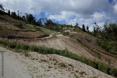A mountain track winds through the Ecuadorian Andes on the Quilotoa Loop hike