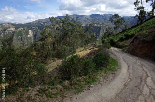 A mountain track winds through the Ecuadorian Andes on the Quilotoa Loop hike