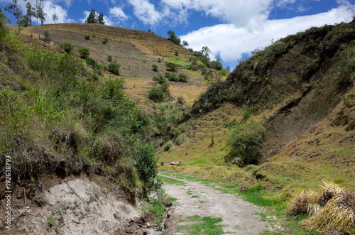 A mountain track winds through the Ecuadorian Andes on the Quilotoa Loop hike