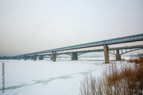 Indoor metro bridge and road of the October bridge across the Ob river. Novosibirsk, Russia © Starover Sibiriak