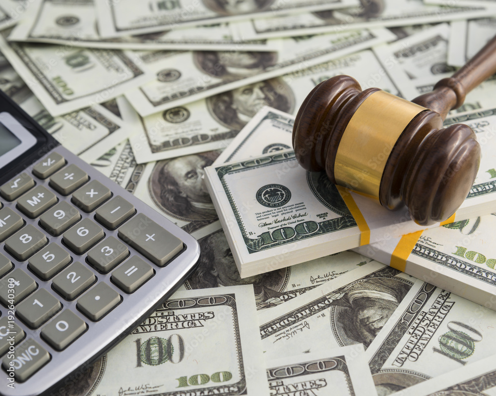 Fototapeta premium Gavel hammer judge money dollar calculator. financial concept, bribe, corruption. Business, court, law. Arrival and punishment