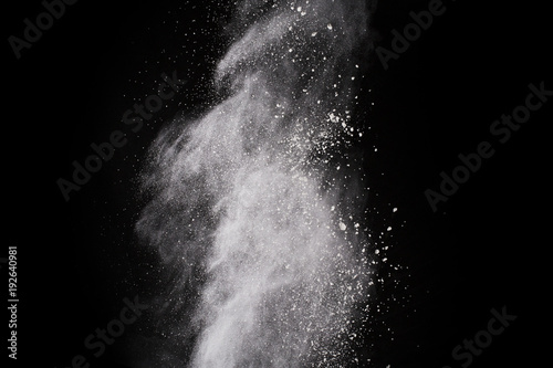 White powder on black background.