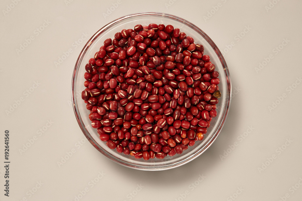 Whole Grains. Top View of Healthy grain foods in a Glass bowl on grey background with Real Shadow. Whole Grains. Top View of Healthy grain foods in a Glass bowl on grey background with Real Shadow.