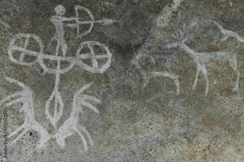 drawing of an ancient man on a cave wall. ancient hunters. stone Age.