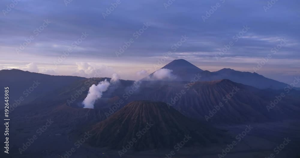 Time Lapse of Mount Bromo volcano during sunrise from viewpoint on Mount Penanjakan in Bromo Tengger Semeru National Park, Indonesia. Time Lapse of Mount Bromo volcano during sunrise from viewpoint on Mount Penanjakan in Bromo Tengger Semeru National Park, Indonesia.