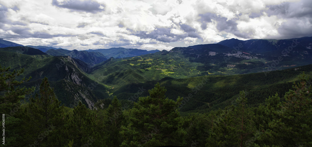 Green and rocky landscape from Mirador de Gresolet. Pyrenees, Catalonia, Spain
