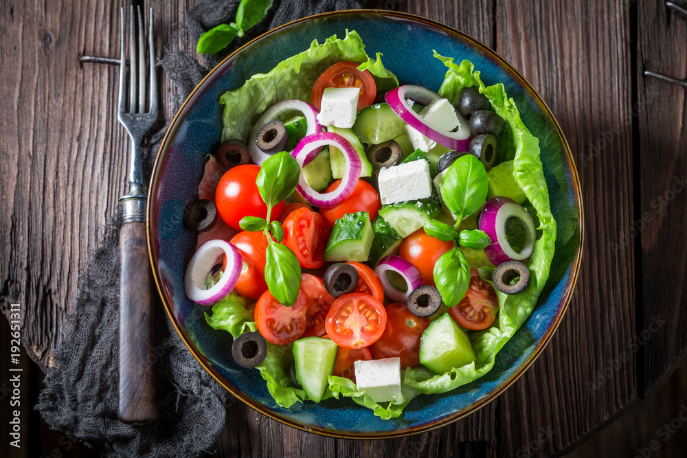 Top view of Greek salad made of fresh vegetables