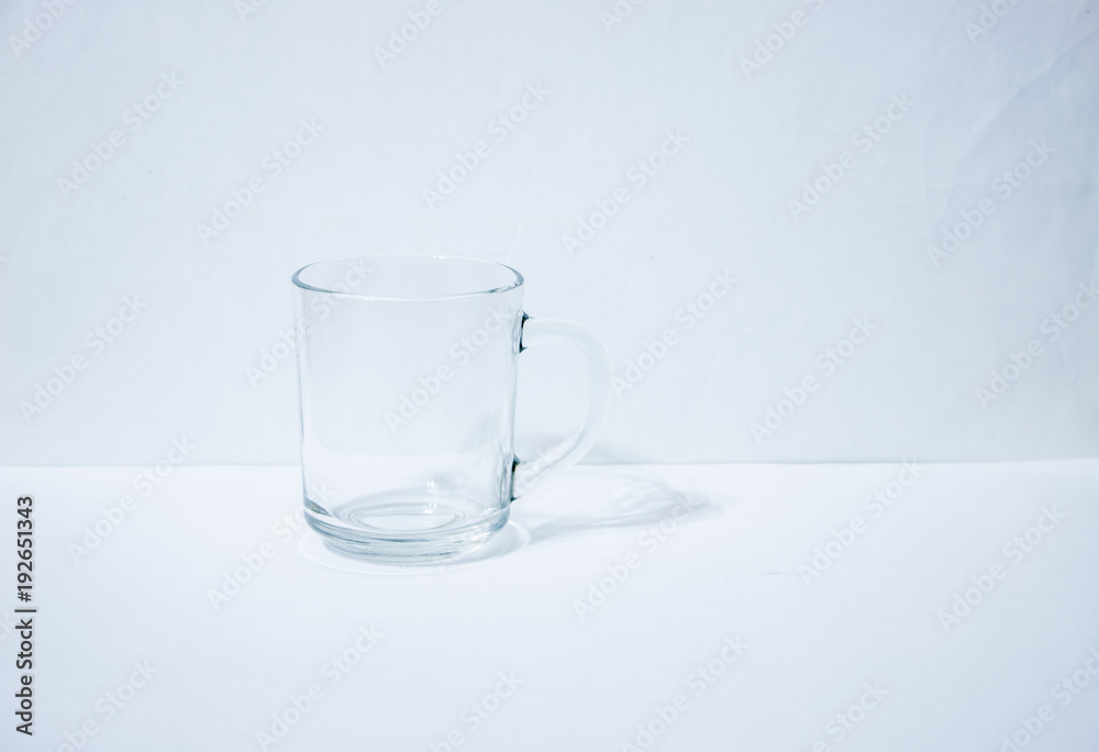 One empty glass beaker One empty glass beaker